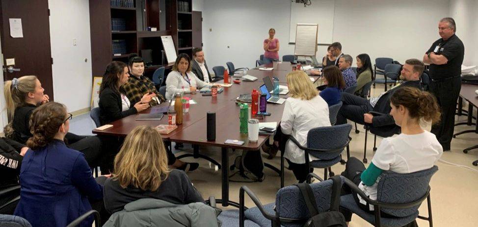 Jon Huddy facilitates process improvement workshop with IWK team in conference room